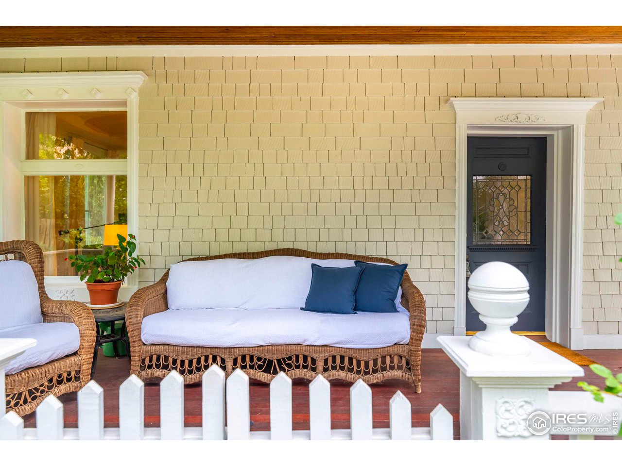 1063 Mapleton Avenue Boulder, CO 80304 - Photo 8 of 38 a living room with furniture and a potted plant