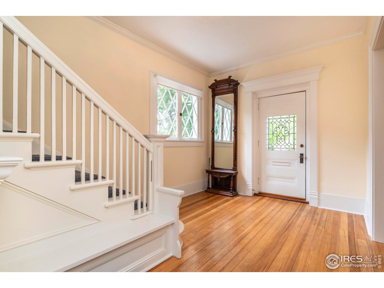 1063 Mapleton Avenue Boulder, CO 80304 - Photo 9 of 38 a view of an entryway with wooden floor