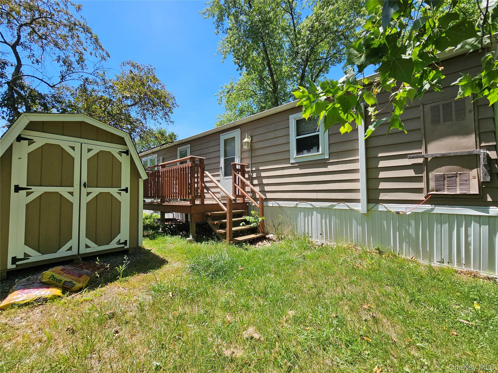 57 Sheafe Road Wappingers Falls, NY 12601 - Photo 2 of 20 Freestanding storage shed with double doors
