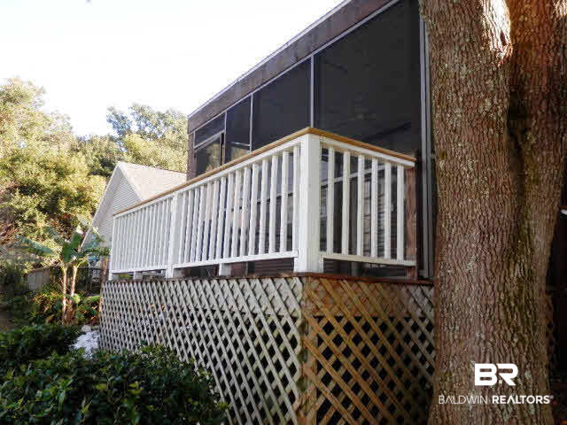 229 Spring Lake Drive Fairhope, AL 36532 - Photo 15 of 21 Back screened-in porch at Lake side.