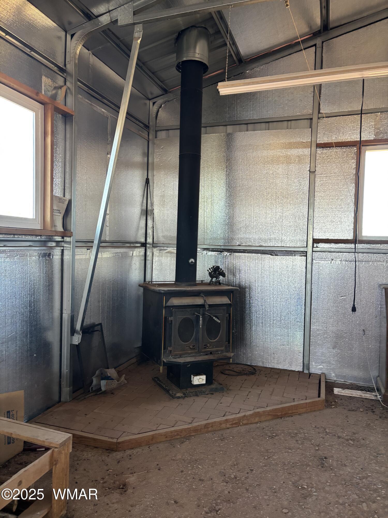 5985 Cow Bell Road Heber, AZ 85928 - Photo 19 of 26 Stove Inside of Garage