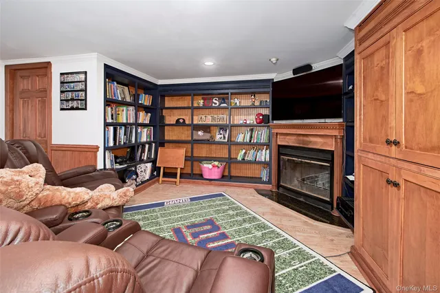 a view of backyard with table and chairs and wooden fence