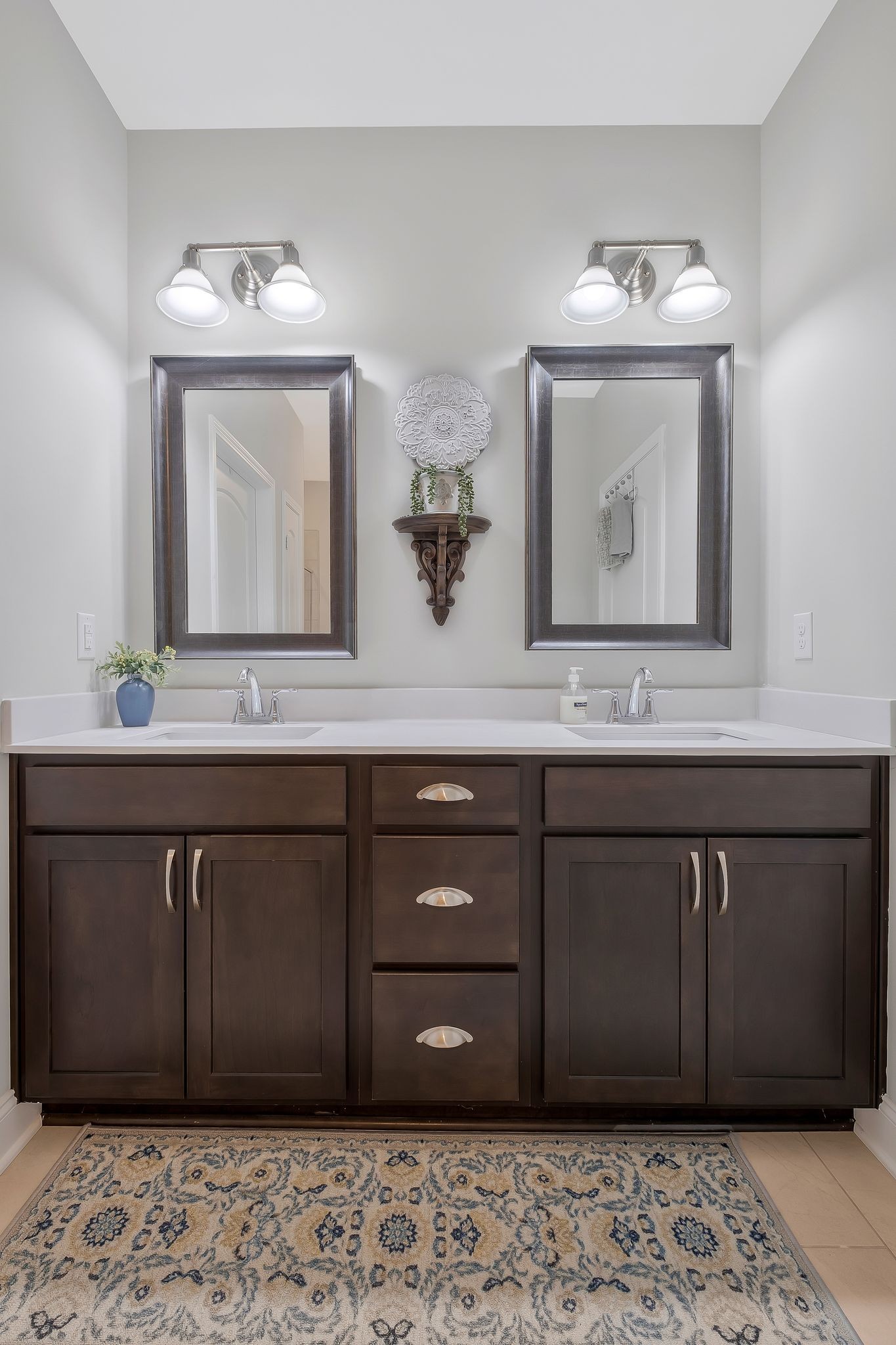 100 Jane Crossing Mount Juliet, TN 37122 - Photo 18 of 33 a bathroom with a sink and a mirror