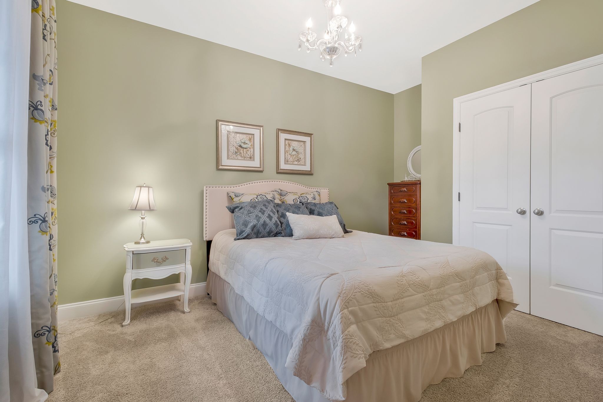 100 Jane Crossing Mount Juliet, TN 37122 - Photo 21 of 33 a bedroom with a bed and a lamp