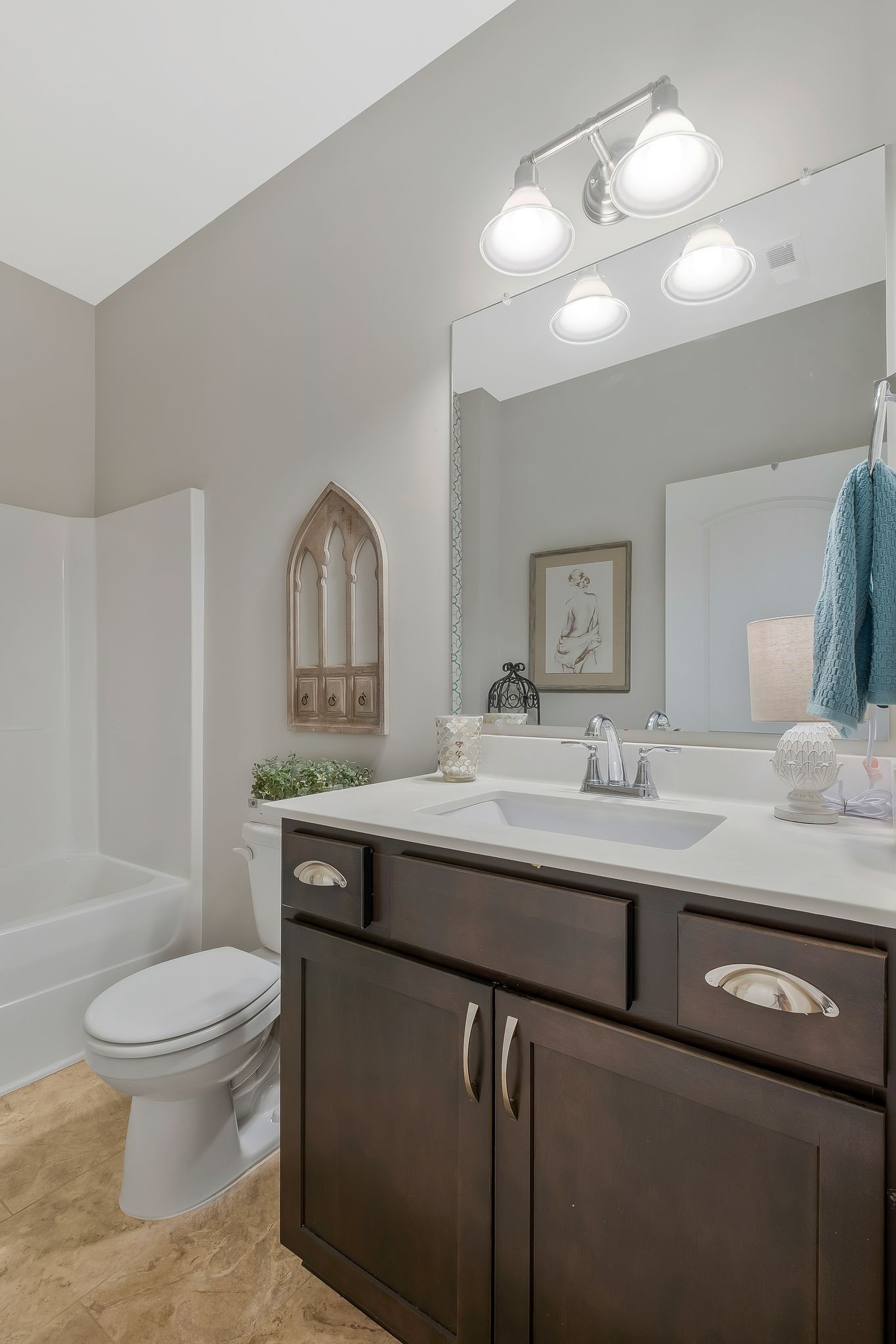 100 Jane Crossing Mount Juliet, TN 37122 - Photo 24 of 33 a bathroom with a granite countertop toilet a sink and a mirror