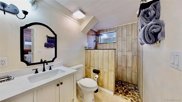 a room with gym equipment and large window