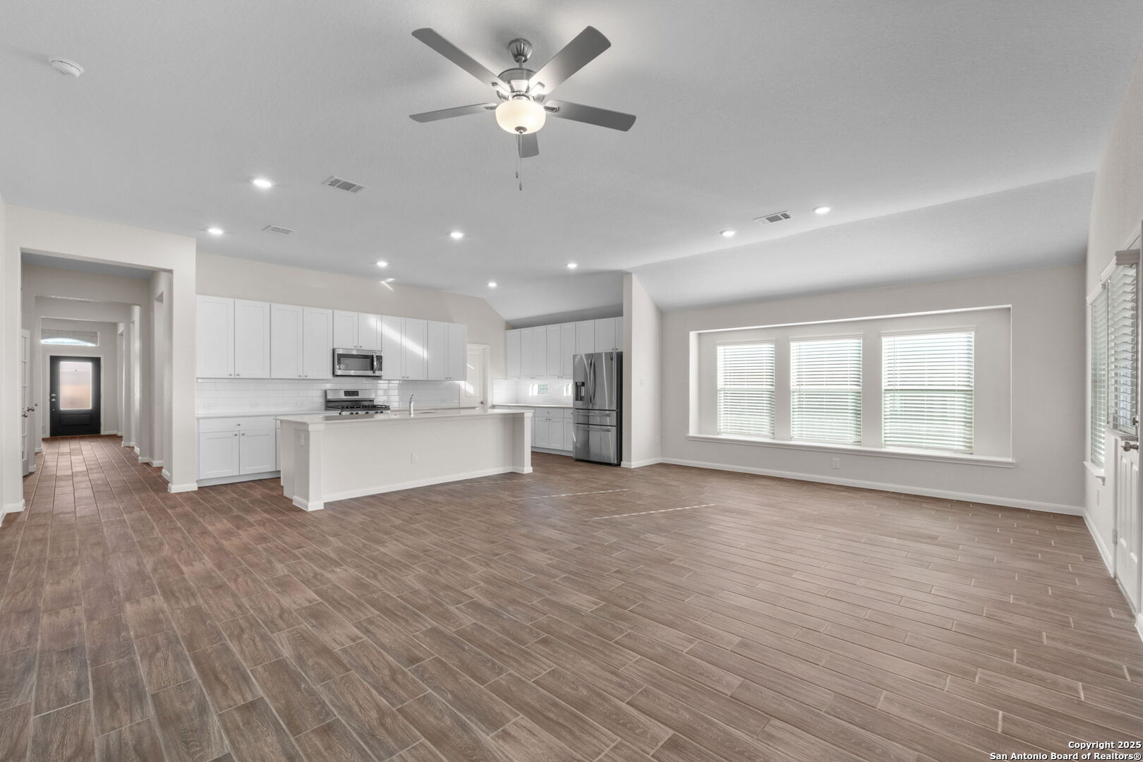 6056 Draw Loop Bulverde, TX 78163 - Photo 21 of 36 a view of empty room with wooden floor and window