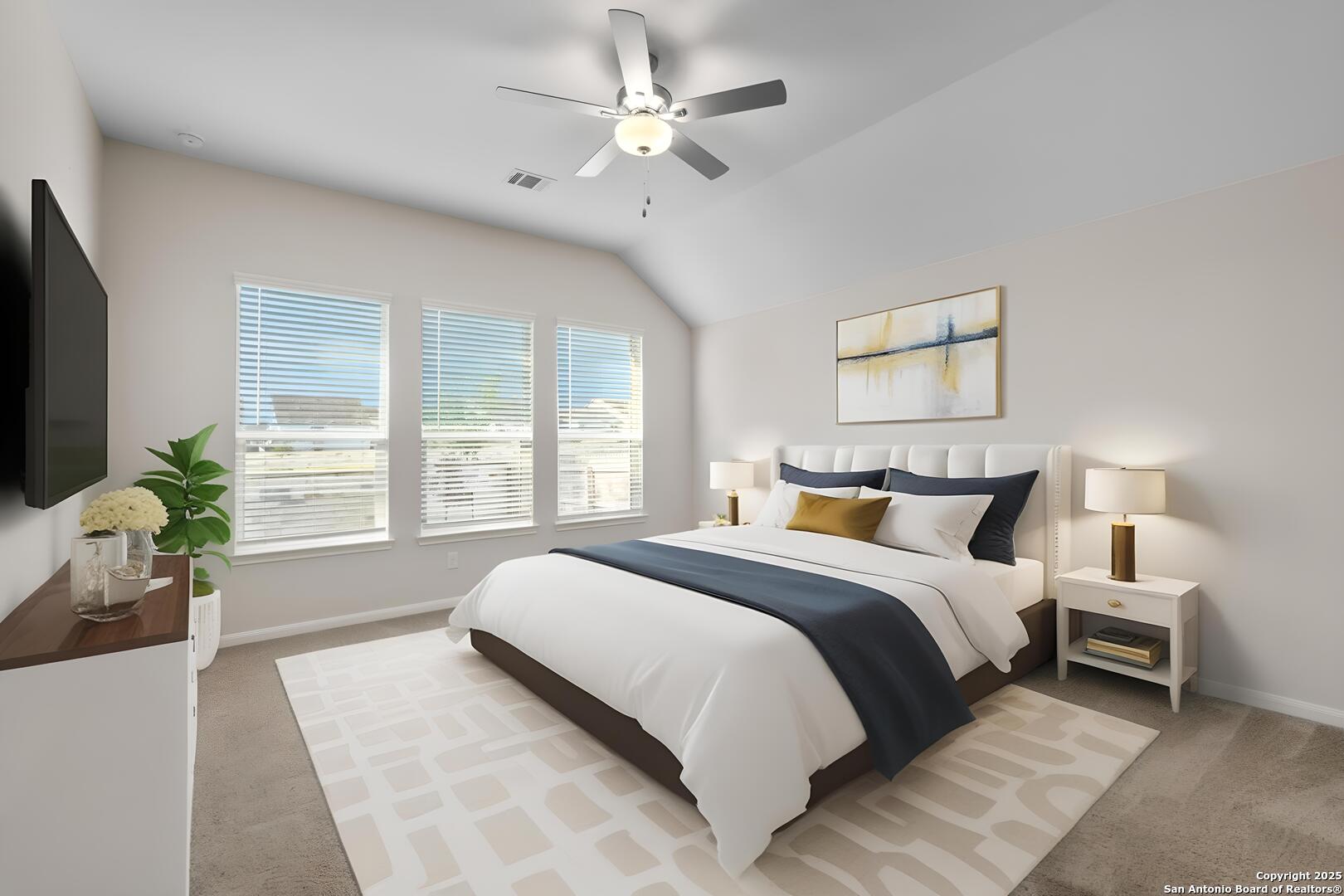 6056 Draw Loop Bulverde, TX 78163 - Photo 26 of 36 a spacious bedroom with a large bed and a chandelier