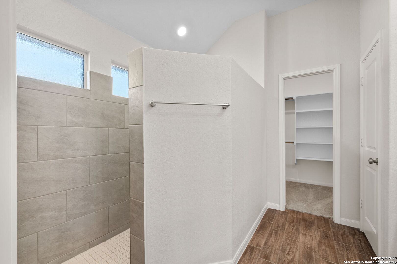 6056 Draw Loop Bulverde, TX 78163 - Photo 28 of 36 a room view with wooden floor and closet