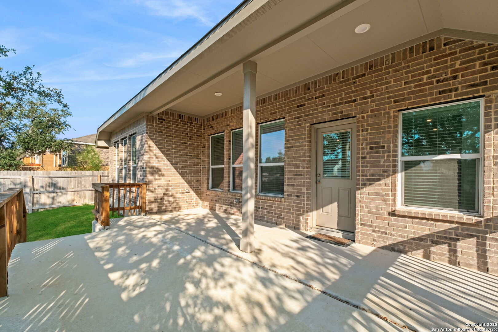 6056 Draw Loop Bulverde, TX 78163 - Photo 31 of 36 a view of a house with a yard