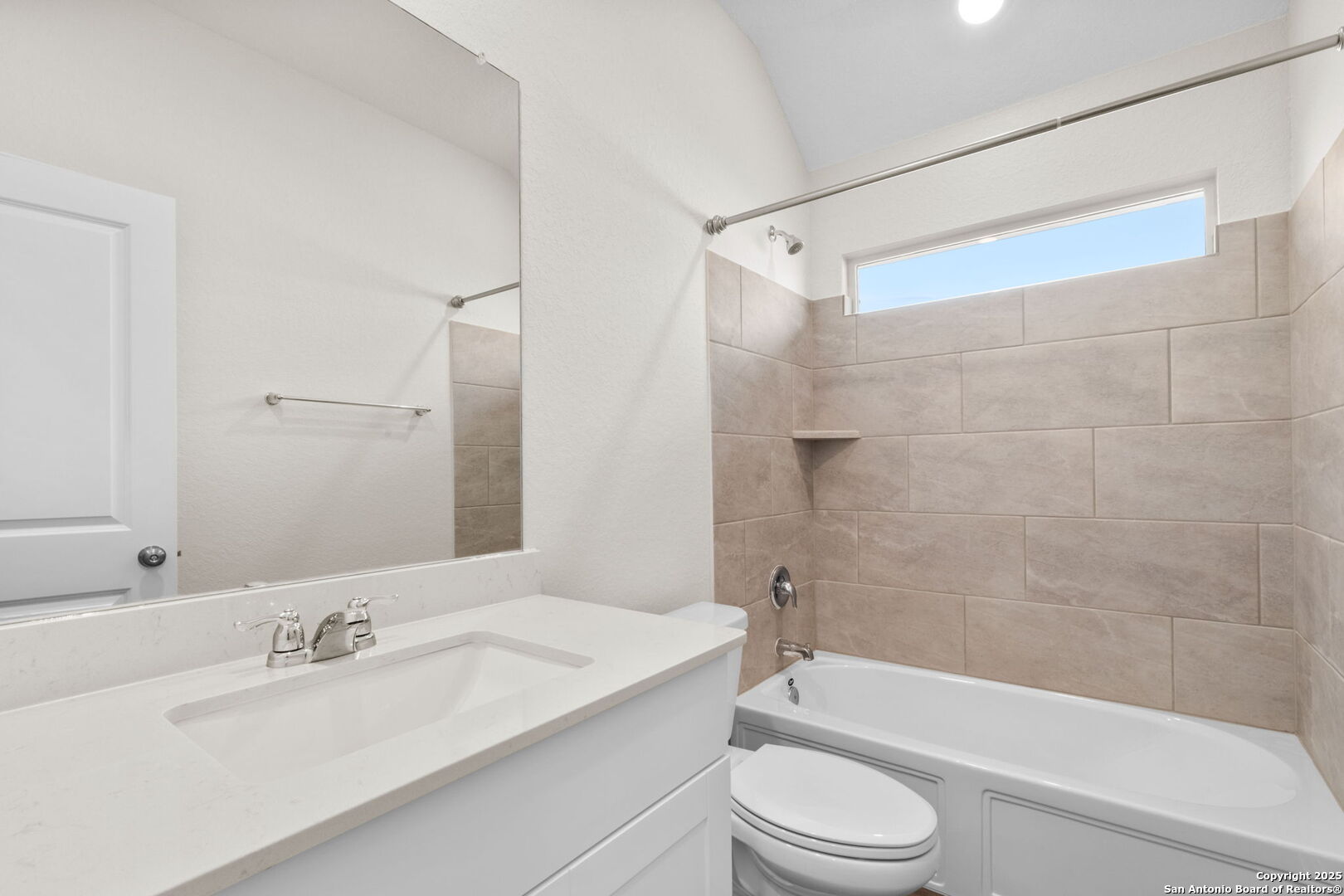 6056 Draw Loop Bulverde, TX 78163 - Photo 6 of 36 a bathroom with a sink a toilet and a bathtub