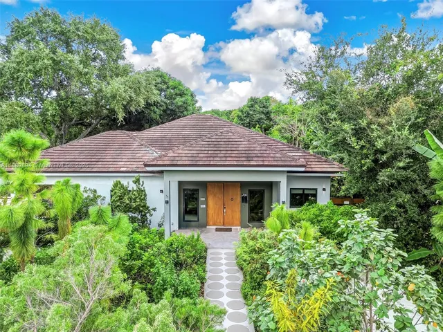 a house view with a garden