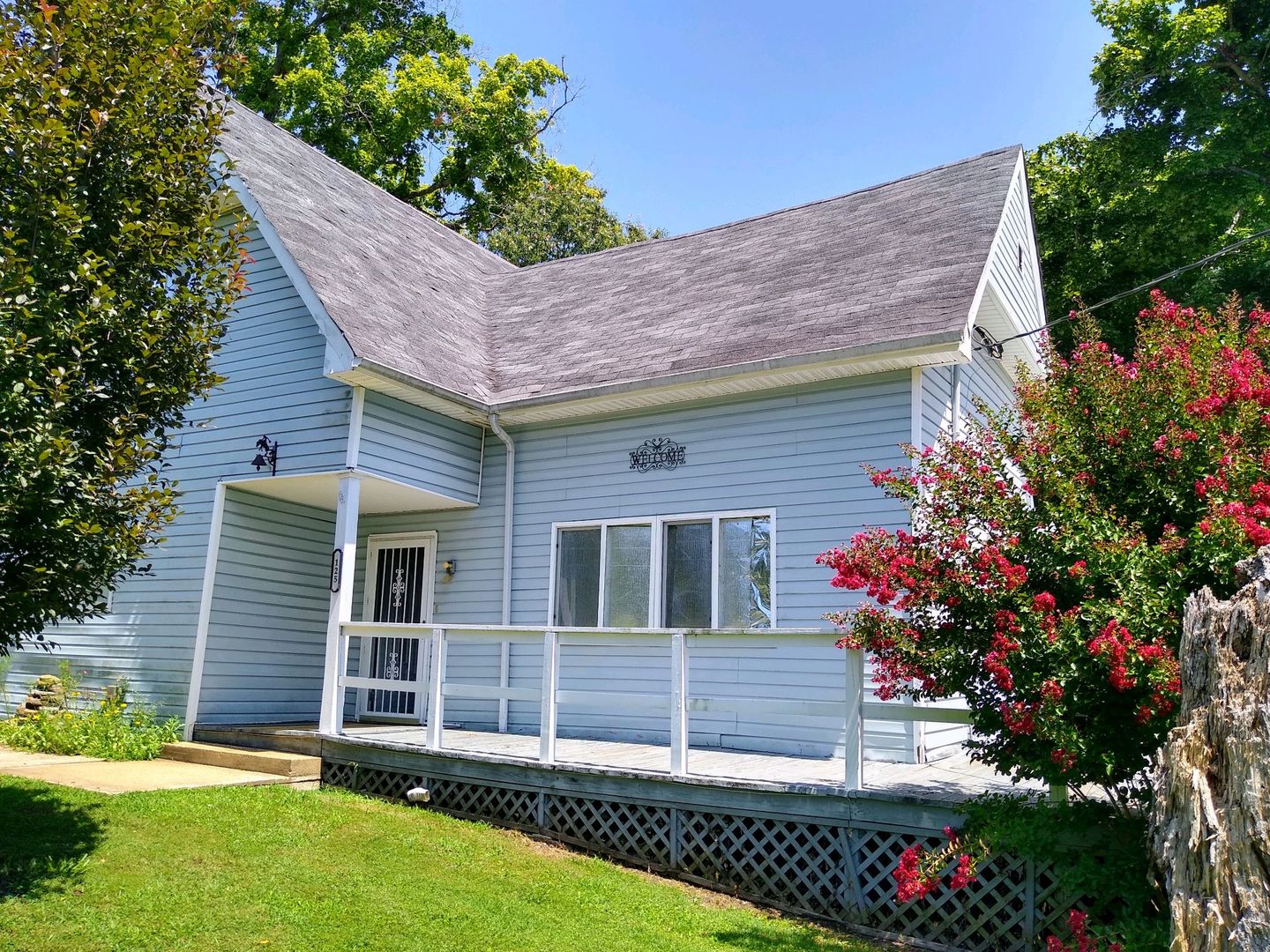 125 Central Hill Road Grantsburg, IL 62943 - Photo 1 of 21 a front view of a house with a yard