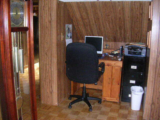 125 Central Hill Road Grantsburg, IL 62943 - Photo 17 of 21 a view of a workspace with furniture and a gate