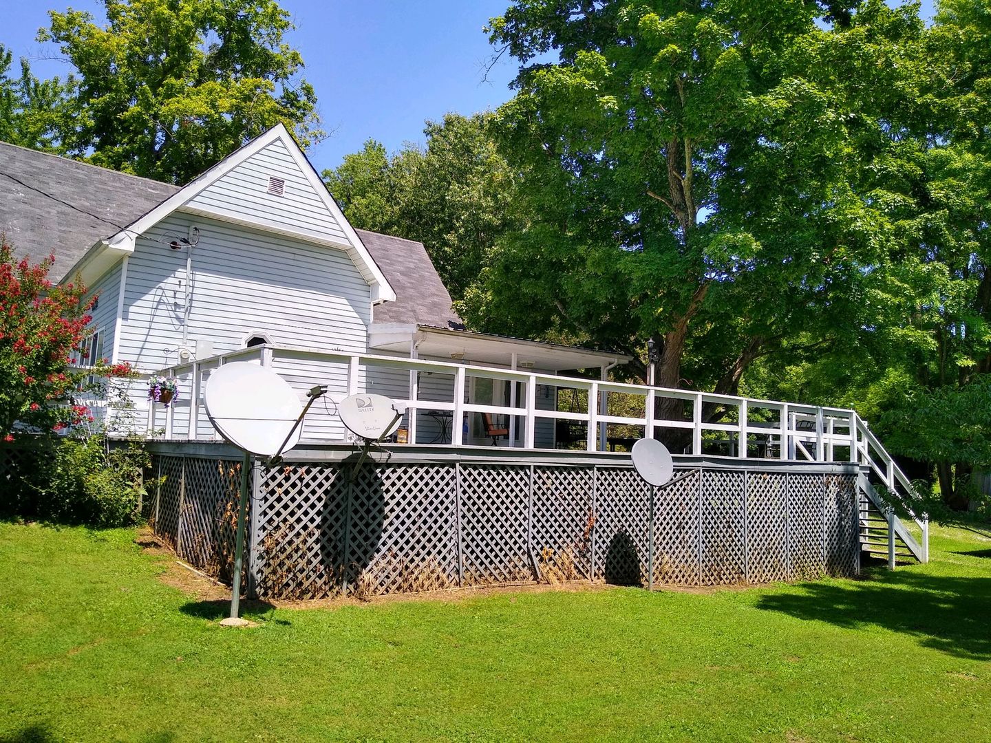 125 Central Hill Road Grantsburg, IL 62943 - Photo 3 of 21 a front view of a house with a garden