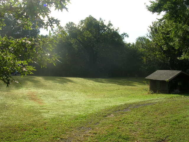 125 Central Hill Road Grantsburg, IL 62943 - Photo 10 of 21 a view of a swimming pool with a yard