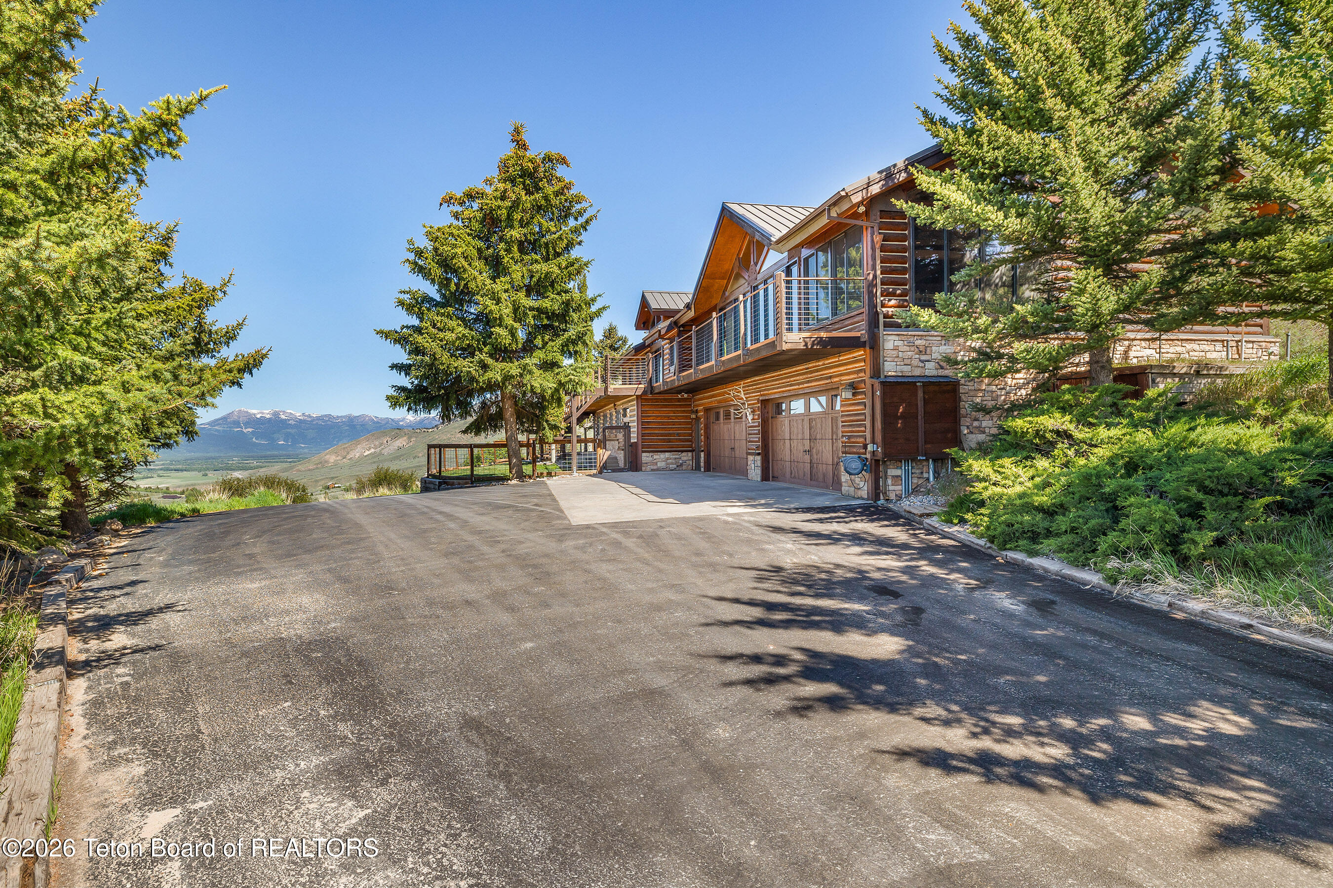 2490 La Bonte Road Jackson, WY 83001 - Photo 31 of 50 Driveway to Garage Doors_email