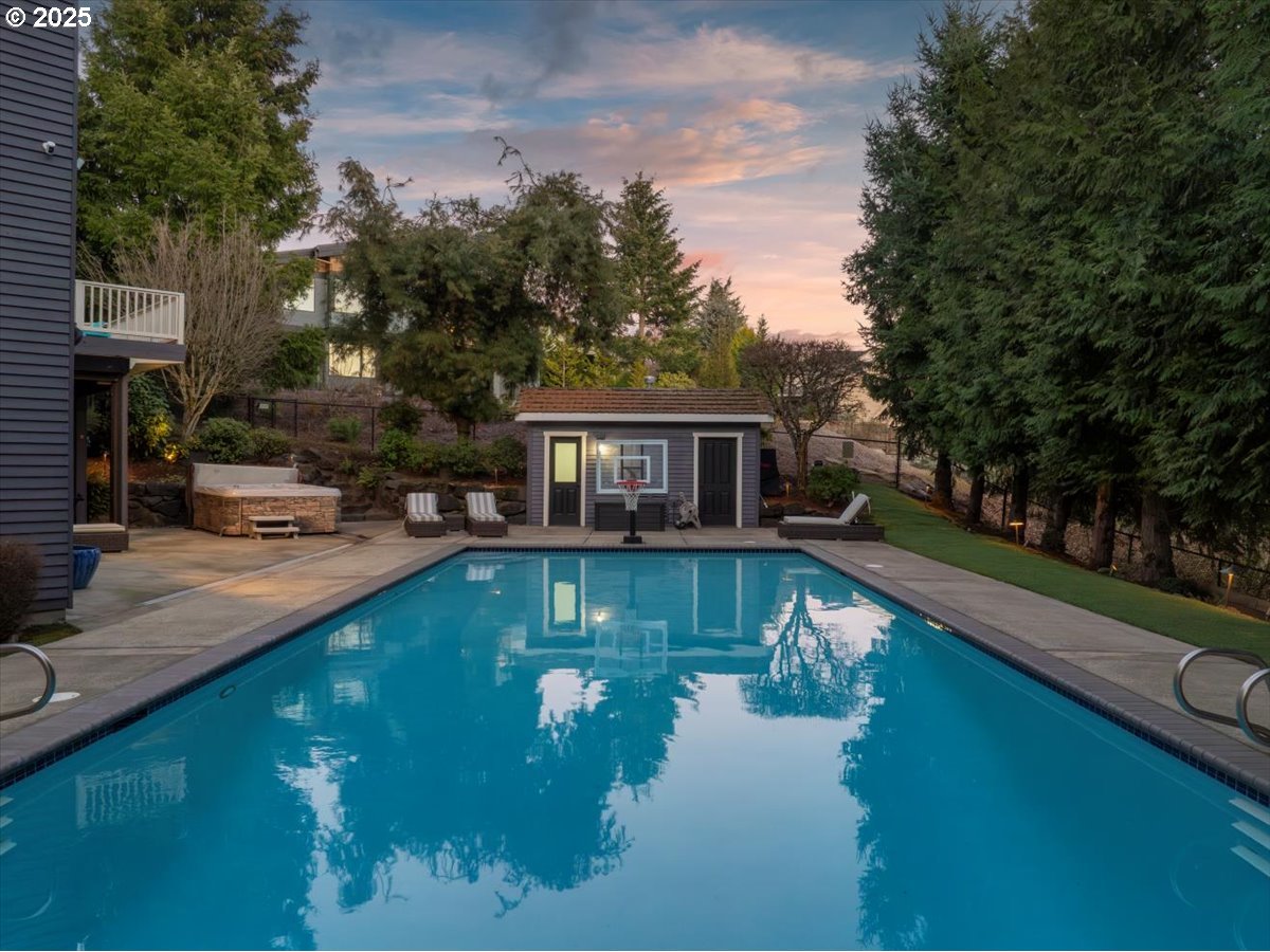 14960 Southwest Brooklet Place Portland, OR 97224 - Photo 4 of 7 a view of house with swimming pool next to a yard