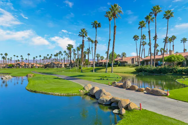 a view of a lake with a house