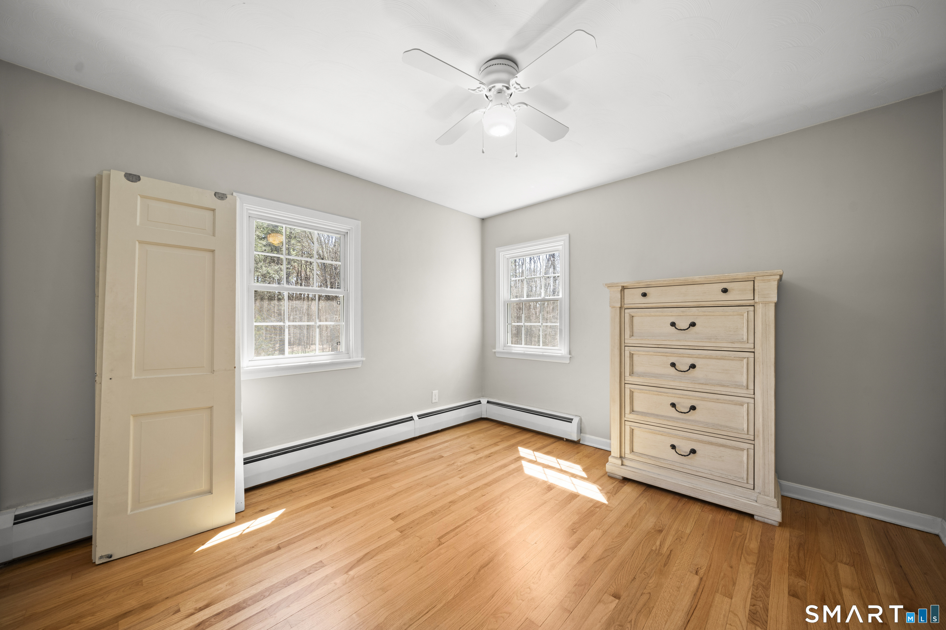 85 Lawton Road Canton, CT 06019 - Photo 30 of 38 wooden floor in an empty room with a window