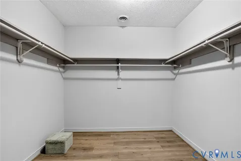 a view of a room with racks on the wall