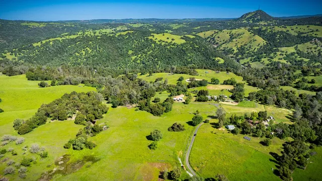 a view of a swimming pool with a lake