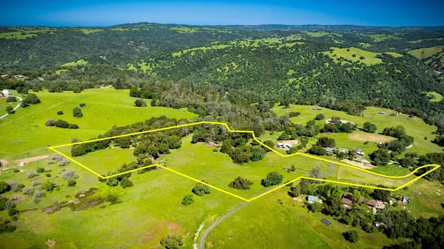 a view of swimming pool with a yard