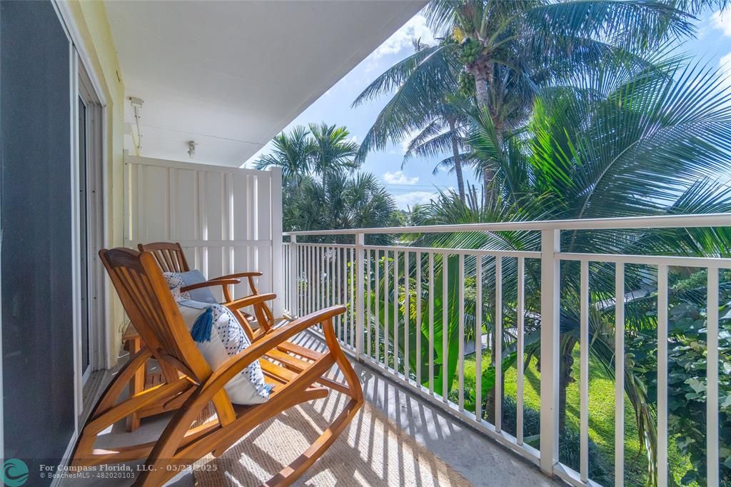 6520 North Ocean Boulevard, Unit 22 Boynton Beach, FL 33435 - Photo 18 of 27 a view of a balcony with furniture