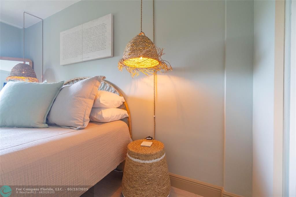 6520 North Ocean Boulevard, Unit 22 Boynton Beach, FL 33435 - Photo 10 of 27 a room with a bed and a table