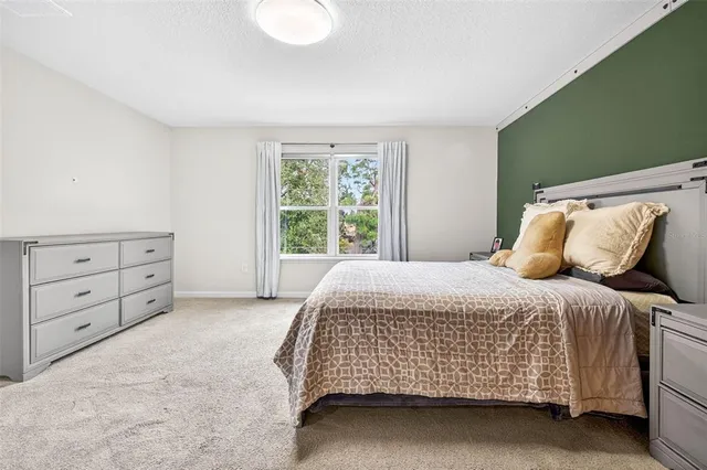 a bathroom with a double vanity sink mirror double and a shower