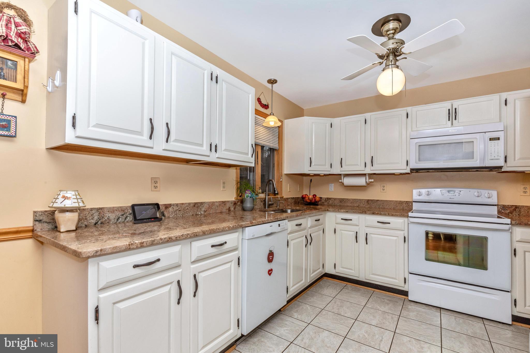 11789 Rowe Road Monrovia, MD 21770 - Photo 14 of 82 Kitchen with Granite Counter tops all around