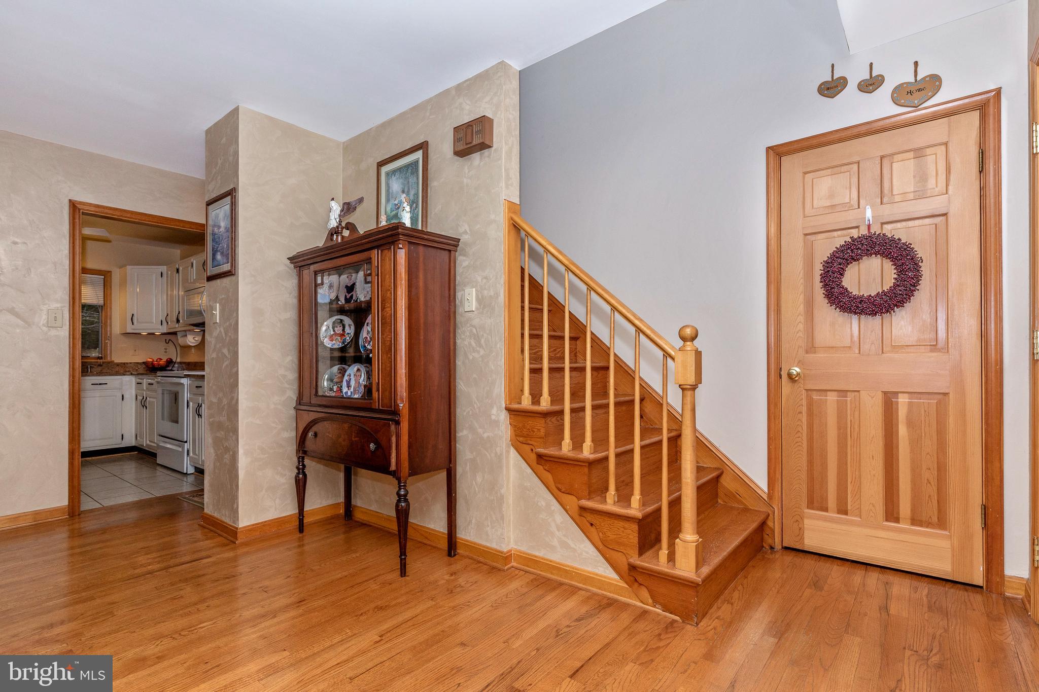 11789 Rowe Road Monrovia, MD 21770 - Photo 28 of 82 Stairs to 2nd Level & Coat Closet near Front Door