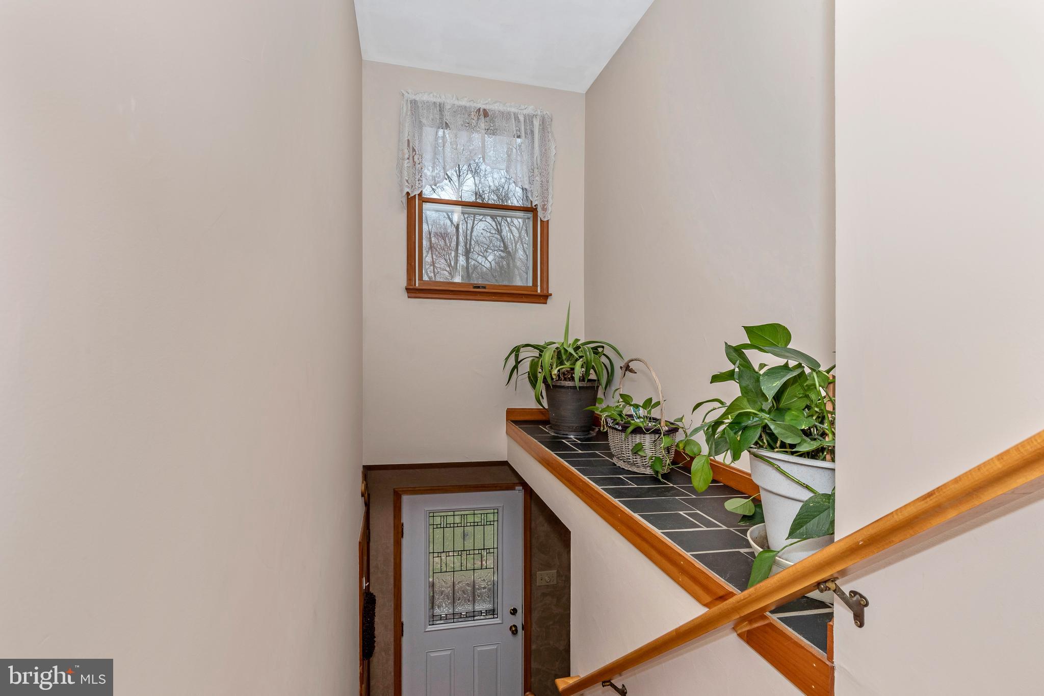 11789 Rowe Road Monrovia, MD 21770 - Photo 29 of 82 Stairs from 2nd Level with view of Front Door