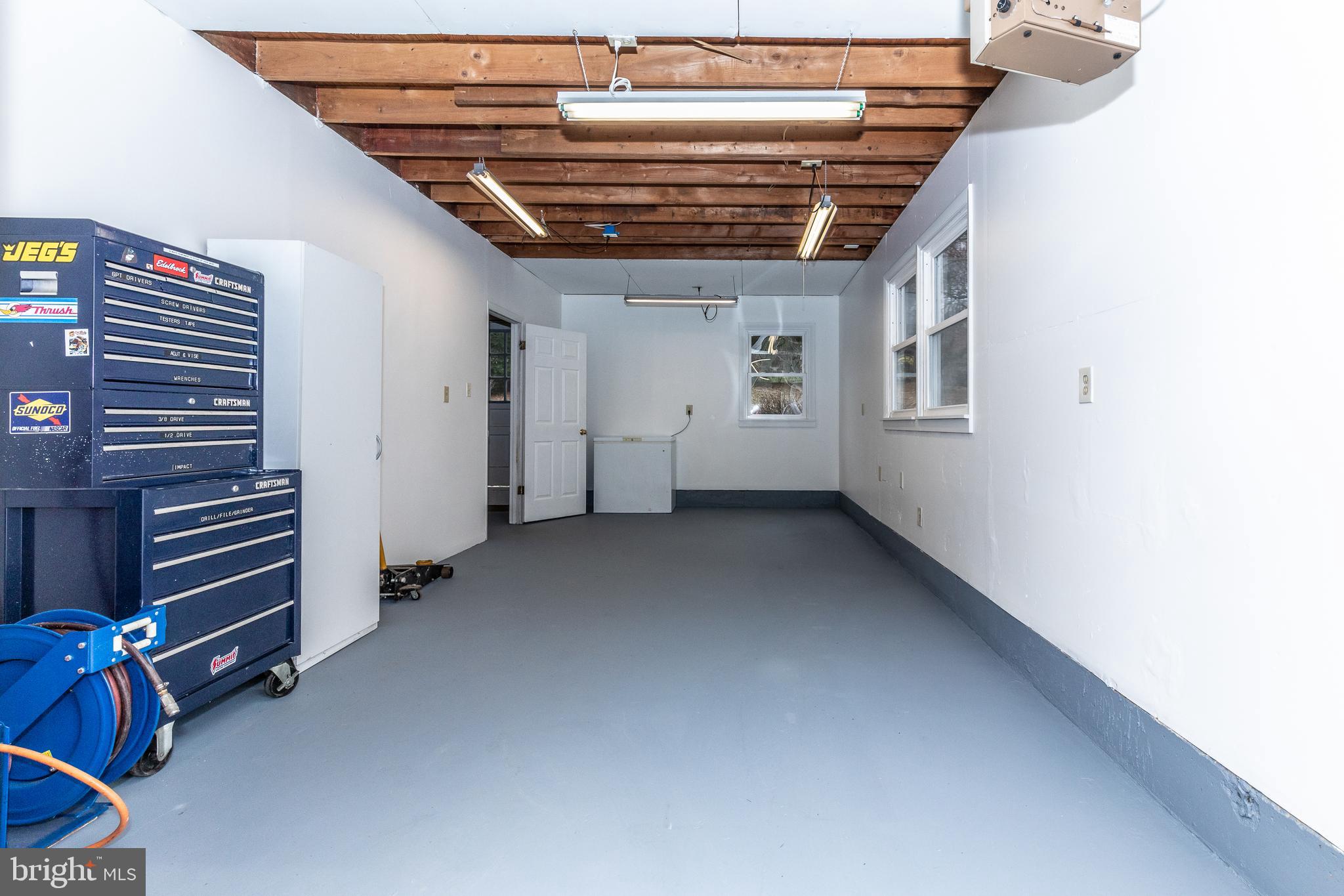11789 Rowe Road Monrovia, MD 21770 - Photo 56 of 82 Large Workshop with Windows, lots of natural light