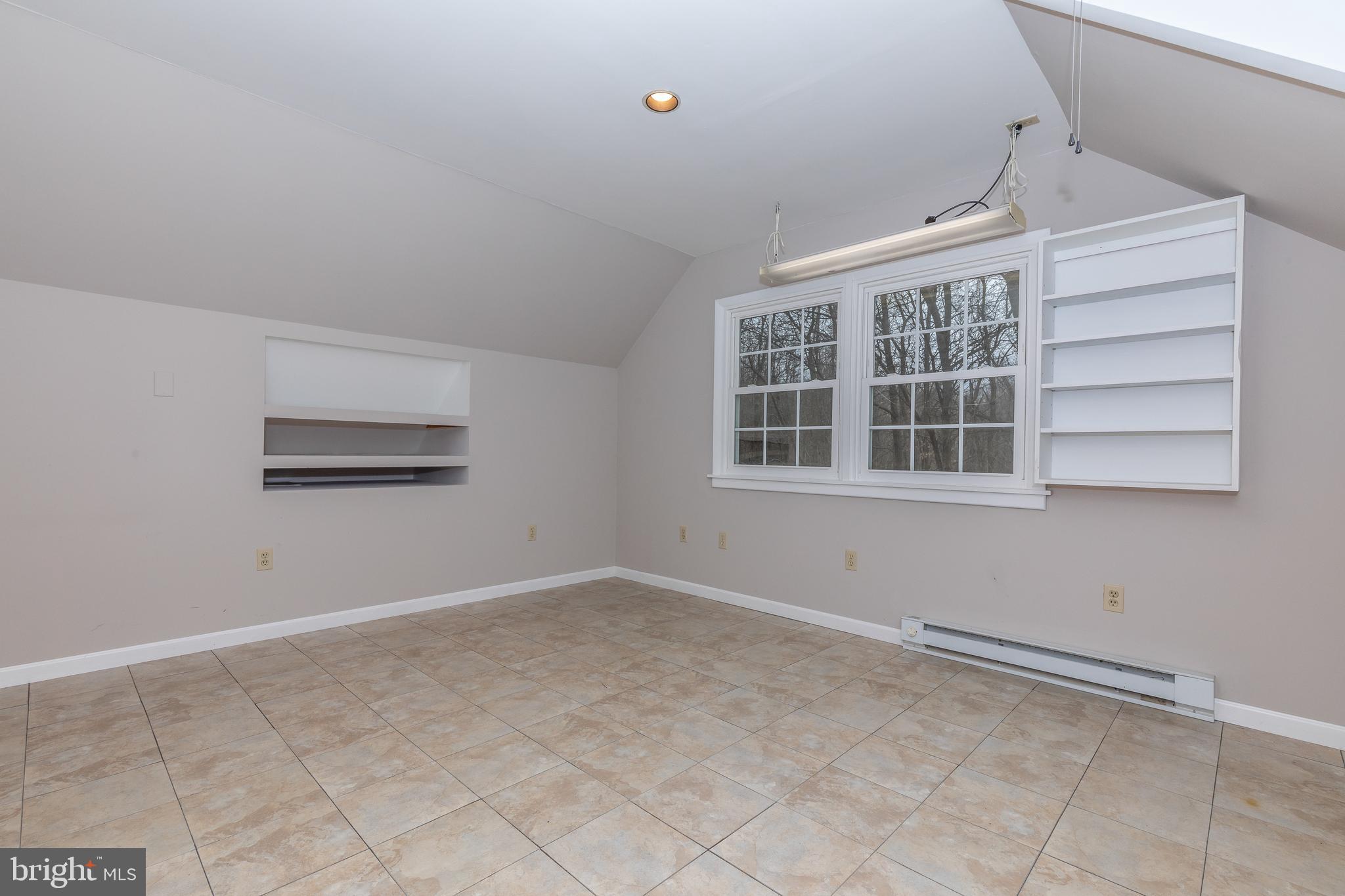 11789 Rowe Road Monrovia, MD 21770 - Photo 58 of 82 Studio with Electric outlets & Built-in Shelving