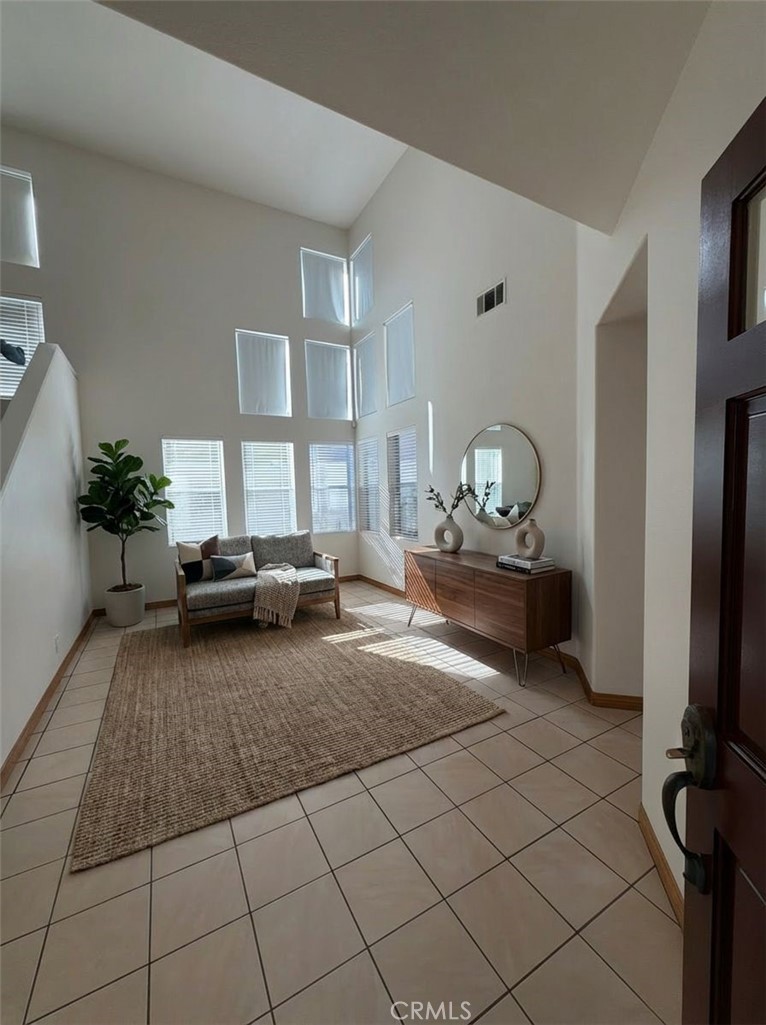17 Pastora Lake Forest, CA 92610 - Photo 13 of 53 a living room with furniture and a flat screen tv