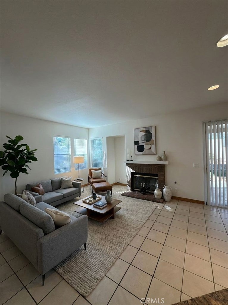 17 Pastora Lake Forest, CA 92610 - Photo 25 of 53 a living room with furniture and a fireplace