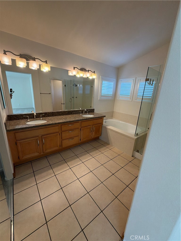 17 Pastora Lake Forest, CA 92610 - Photo 39 of 53 a room with lot of cabinets and appliances