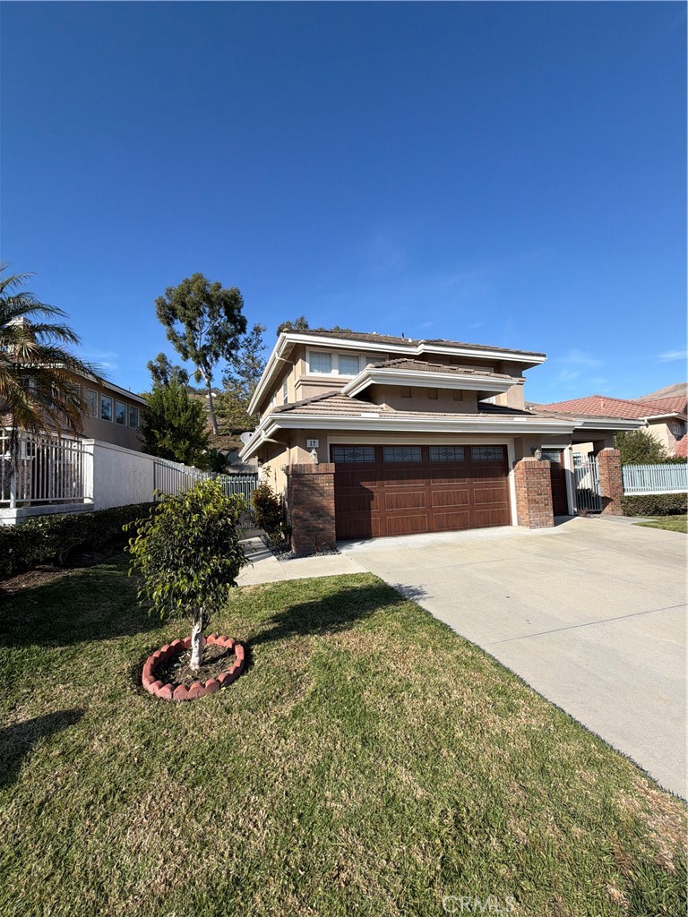 17 Pastora Lake Forest, CA 92610 - Photo 5 of 53 a front view of a house with a yard