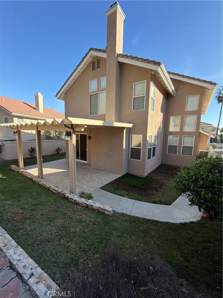 17 Pastora Lake Forest, CA 92610 - Photo 51 of 53 a front view of a house with a yard