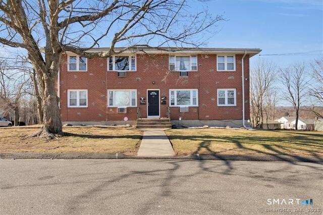 a view of a house with a swimming pool