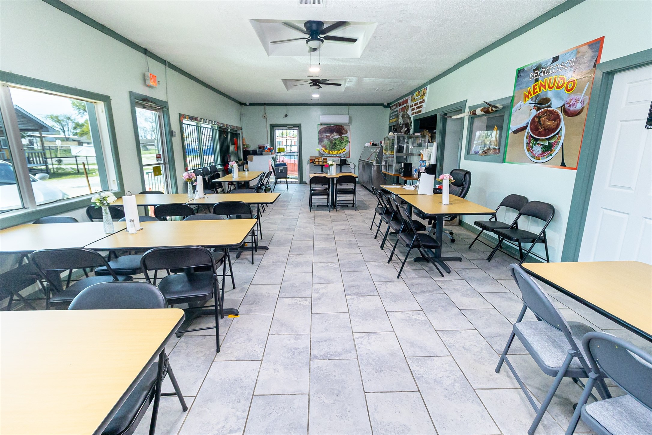1137 Freeport Street Houston, TX 77015 - Photo 11 of 27 a view of a dining room with furniture and a potted plant