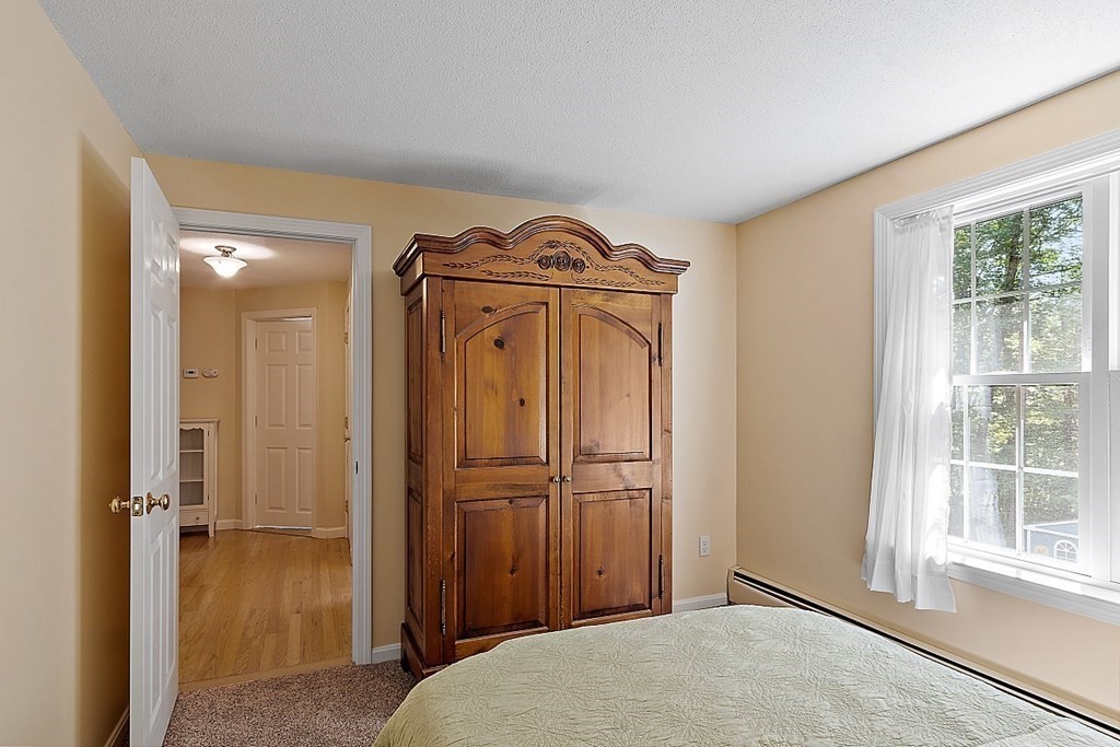 69 Hill Road Groton, MA 01450 - Photo 40 of 42 wooden floor in an empty room