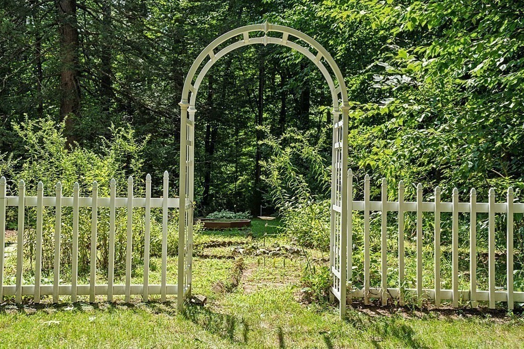 69 Hill Road Groton, MA 01450 - Photo 7 of 42 a view of a garden