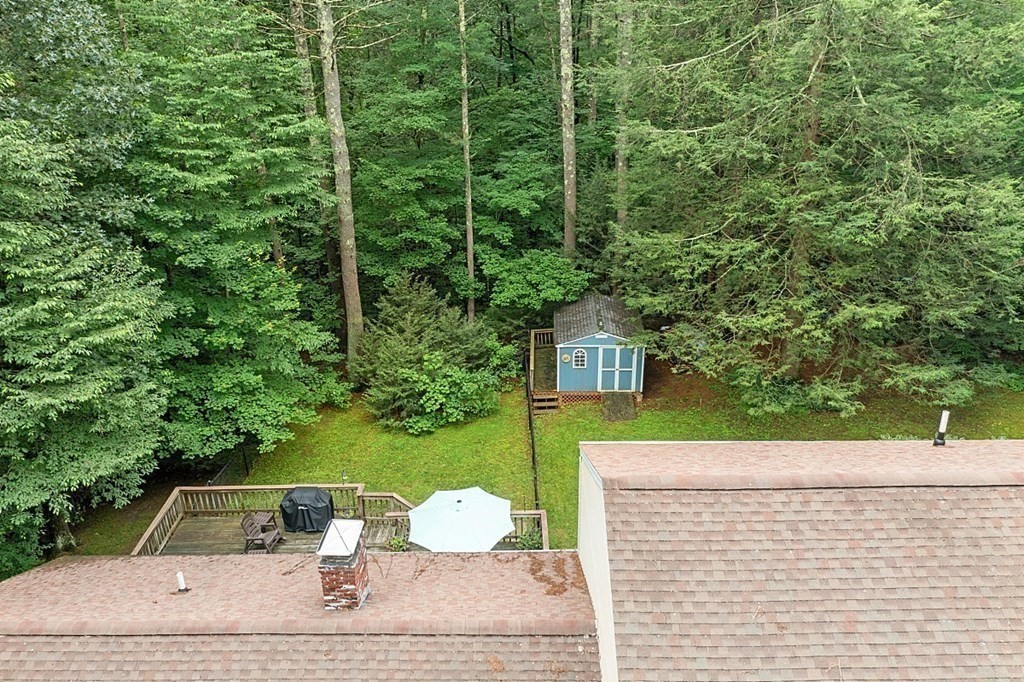 69 Hill Road Groton, MA 01450 - Photo 8 of 42 a view of a outdoor space