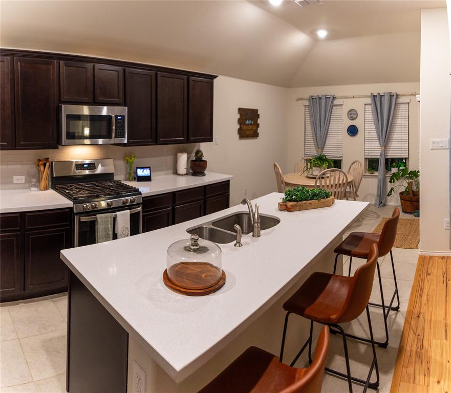 14525 Serrano Ridge Road Fort Worth, TX 76052 - Photo 5 of 12 Large kitchen island