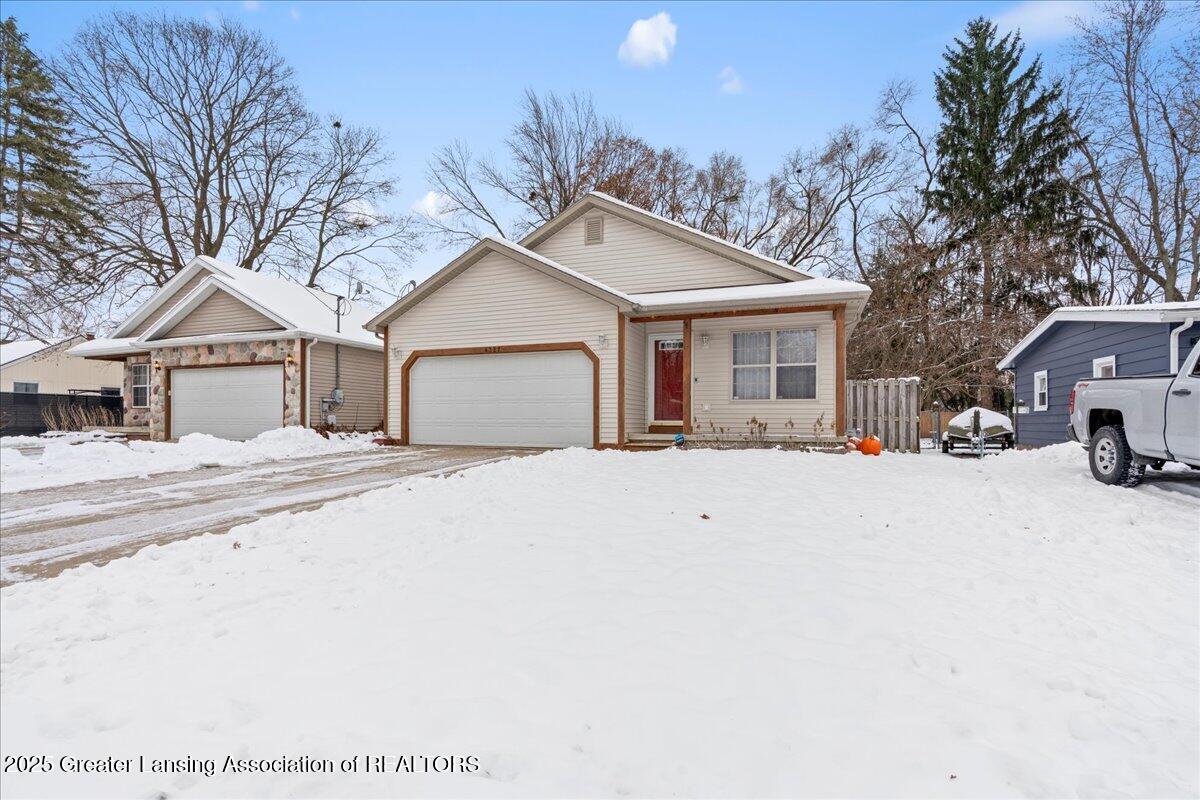 4327 Keller Road Holt, MI 48842 - Photo 4 of 45 Front Right Exterior