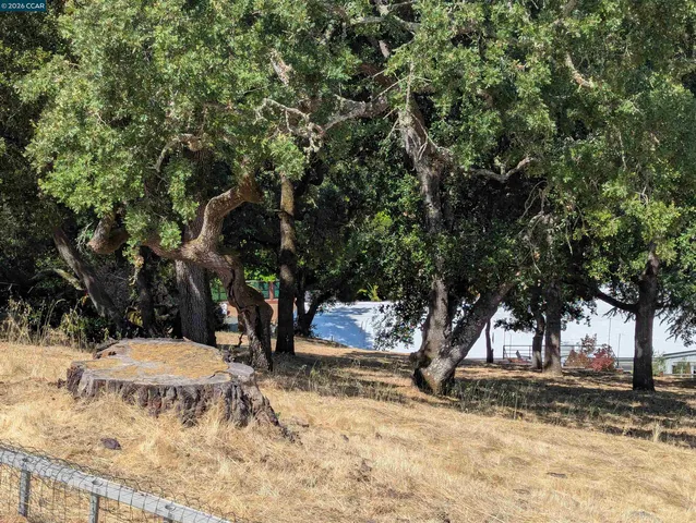 a sign that is sitting on a wooden wall