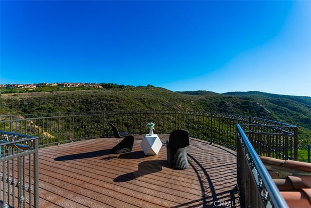 a view of balcony with furniture