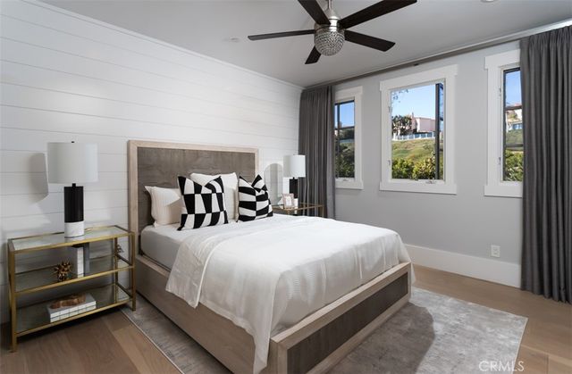 a bed room with a bed and a window